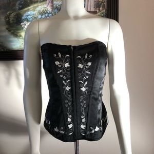 Black corset with white flower detail